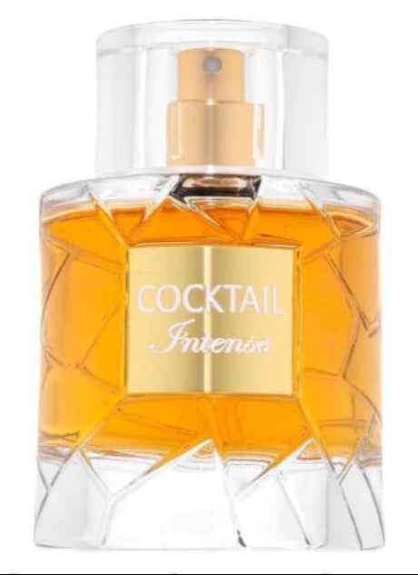 EAU DE PARFUM Cocktail Intense de Fragrance World en botella con diseño facetado y líquido ámbar