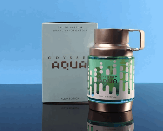 ARMAF Odyssey Aqua Eau de Parfum with turquoise liquid and unique metallic spray bottle next to its light blue box